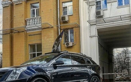 Cadillac SRX II рестайлинг, 2011 год, 900 000 рублей, 1 фотография