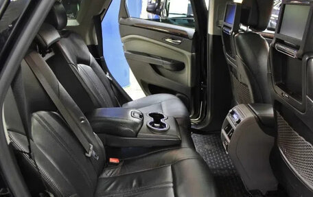 Cadillac SRX II рестайлинг, 2011 год, 900 000 рублей, 3 фотография