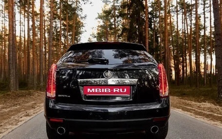 Cadillac SRX II рестайлинг, 2011 год, 900 000 рублей, 9 фотография