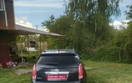 Cadillac SRX II рестайлинг, 2011 год, 900 000 рублей, 12 фотография