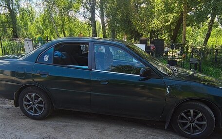 Mitsubishi Mirage VI рестайлинг, 1999 год, 120 000 рублей, 2 фотография