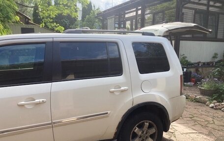 Honda Pilot III рестайлинг, 2011 год, 1 000 000 рублей, 4 фотография
