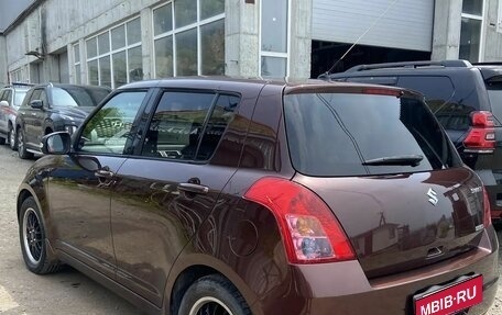 Suzuki Swift III, 2010 год, 700 000 рублей, 1 фотография