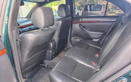 Toyota Avensis III рестайлинг, 2004 год, 677 000 рублей, 15 фотография