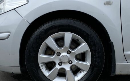 Nissan Tiida, 2010 год, 899 000 рублей, 8 фотография