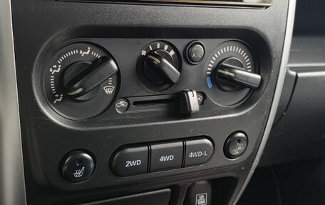 Suzuki Jimny, 2013 год, 1 390 000 рублей, 22 фотография