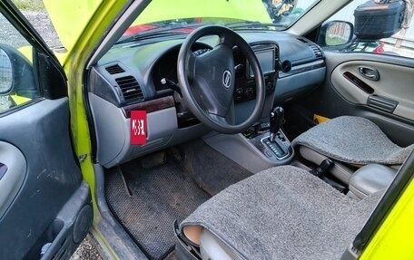 Chevrolet Tracker II, 1999 год, 600 000 рублей, 8 фотография