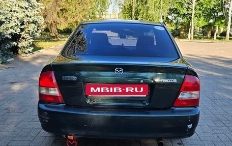 Mazda Protege, 1999 год, 240 000 рублей, 4 фотография