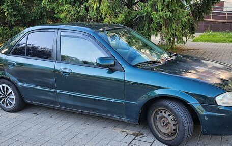Mazda Protege, 1999 год, 240 000 рублей, 7 фотография