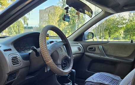Mazda Protege, 1999 год, 240 000 рублей, 9 фотография