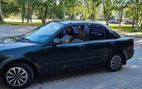 Mazda Protege, 1999 год, 240 000 рублей, 8 фотография