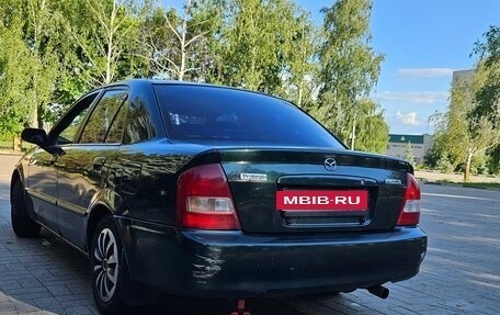 Mazda Protege, 1999 год, 240 000 рублей, 6 фотография