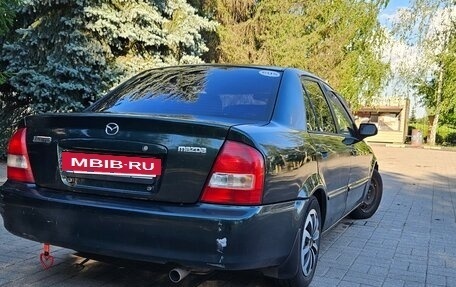 Mazda Protege, 1999 год, 240 000 рублей, 5 фотография