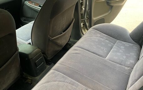 Toyota Avensis III рестайлинг, 2001 год, 350 000 рублей, 21 фотография