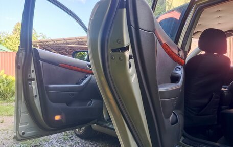 Toyota Avensis III рестайлинг, 2004 год, 600 000 рублей, 13 фотография
