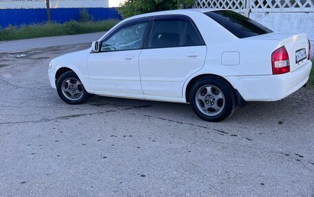 Mazda Familia, 1999 год, 245 000 рублей, 8 фотография