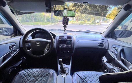 Mazda 323, 2000 год, 210 000 рублей, 11 фотография