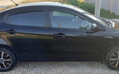 KIA Rio III рестайлинг, 2012 год, 950 000 рублей, 3 фотография