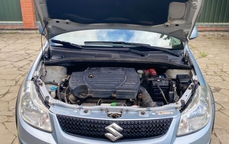 Suzuki SX4 II рестайлинг, 2010 год, 850 000 рублей, 20 фотография