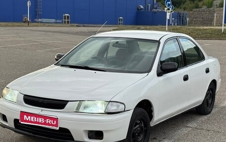 Mazda Familia, 1997 год, 110 000 рублей, 1 фотография