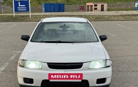 Mazda Familia, 1997 год, 110 000 рублей, 2 фотография