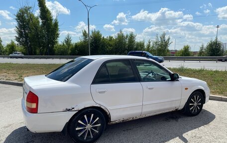 Mazda Familia, 2002 год, 230 000 рублей, 4 фотография
