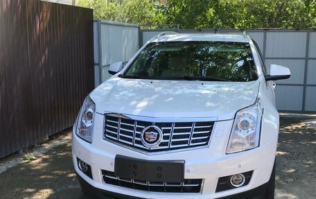 Cadillac SRX II рестайлинг, 2014 год, 2 100 000 рублей, 1 фотография