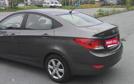 Hyundai Solaris II рестайлинг, 2011 год, 650 000 рублей, 4 фотография