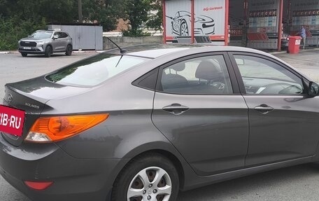 Hyundai Solaris II рестайлинг, 2011 год, 650 000 рублей, 5 фотография