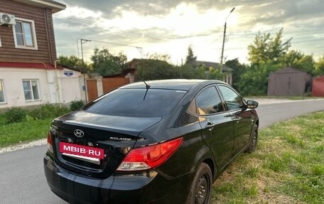 Hyundai Solaris II рестайлинг, 2011 год, 500 000 рублей, 13 фотография