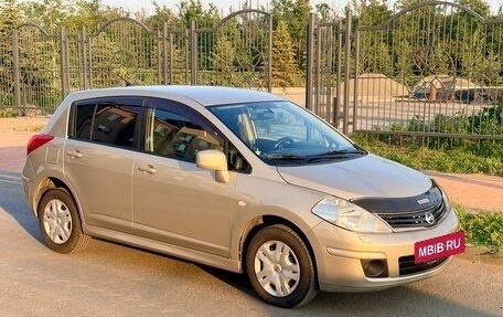 Nissan Tiida, 2010 год, 770 000 рублей, 9 фотография