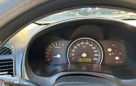 KIA Carnival III, 2009 год, 890 000 рублей, 11 фотография