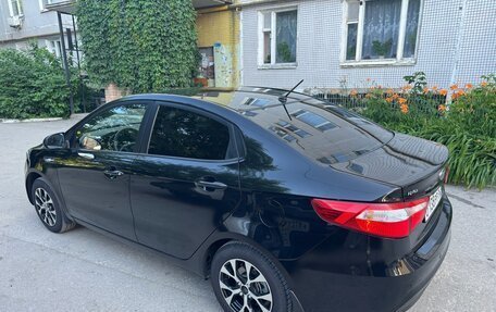 KIA Rio III рестайлинг, 2013 год, 850 000 рублей, 23 фотография