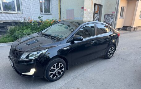 KIA Rio III рестайлинг, 2013 год, 850 000 рублей, 24 фотография