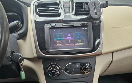 Renault Logan II, 2015 год, 850 000 рублей, 10 фотография