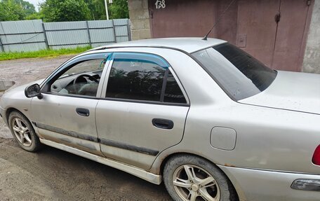 Mitsubishi Carisma I, 2002 год, 90 000 рублей, 9 фотография