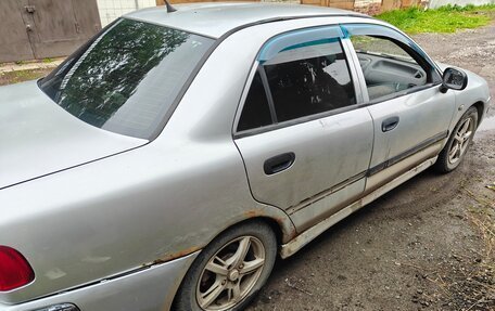 Mitsubishi Carisma I, 2002 год, 90 000 рублей, 12 фотография