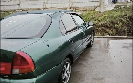 Mitsubishi Carisma I, 1998 год, 190 000 рублей, 8 фотография