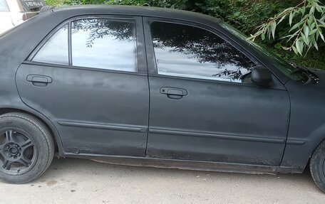 Mazda Protege, 1999 год, 90 000 рублей, 4 фотография