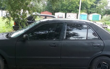 Mazda Protege, 1999 год, 90 000 рублей, 3 фотография
