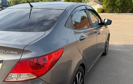 Hyundai Solaris II рестайлинг, 2011 год, 600 000 рублей, 17 фотография