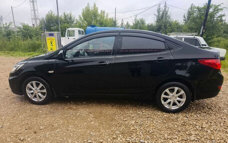 Hyundai Solaris II рестайлинг, 2011 год, 750 000 рублей, 11 фотография