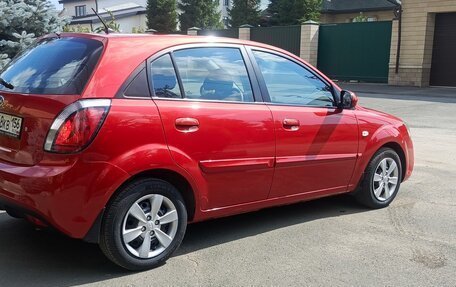 KIA Rio II, 2011 год, 595 000 рублей, 11 фотография