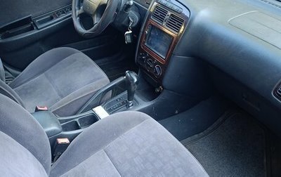 Toyota Avensis III рестайлинг, 2002 год, 600 000 рублей, 1 фотография