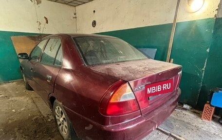 Mitsubishi Lancer VII, 1998 год, 35 000 рублей, 8 фотография