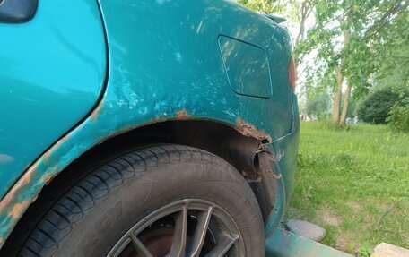 Mazda 323, 1997 год, 160 000 рублей, 10 фотография