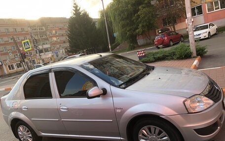 Renault Logan I, 2012 год, 565 000 рублей, 4 фотография