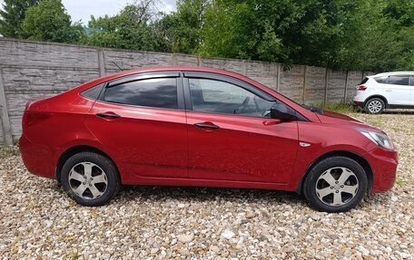 Hyundai Solaris II рестайлинг, 2011 год, 597 000 рублей, 7 фотография