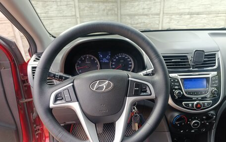 Hyundai Solaris II рестайлинг, 2011 год, 597 000 рублей, 21 фотография