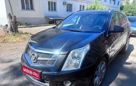 Cadillac SRX II рестайлинг, 2011 год, 290 000 рублей, 1 фотография